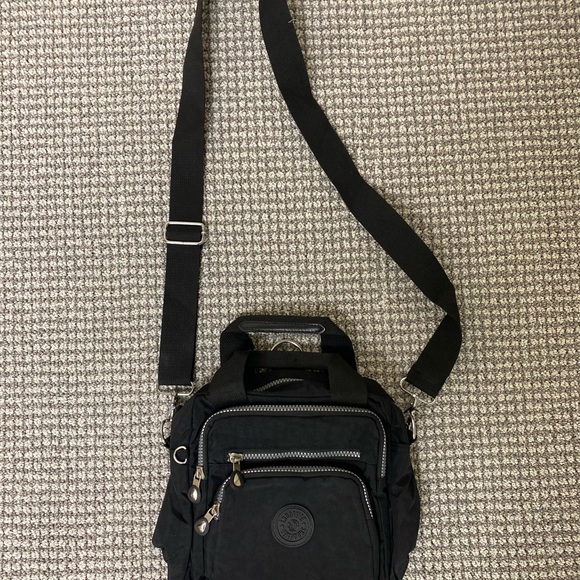 Handbags - NWOT Black Crossbody Sling Bag for women- versatile back pack loops